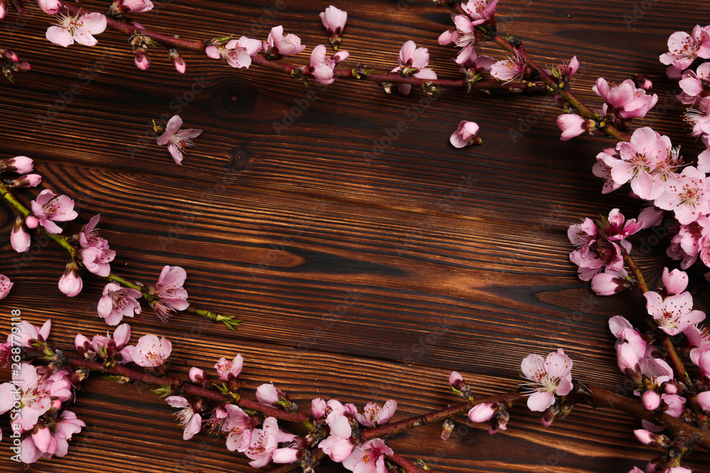 Peach blossom on old wooden background. Fruit flowers. Peach blossom on old wooden background. Fruit flowers.