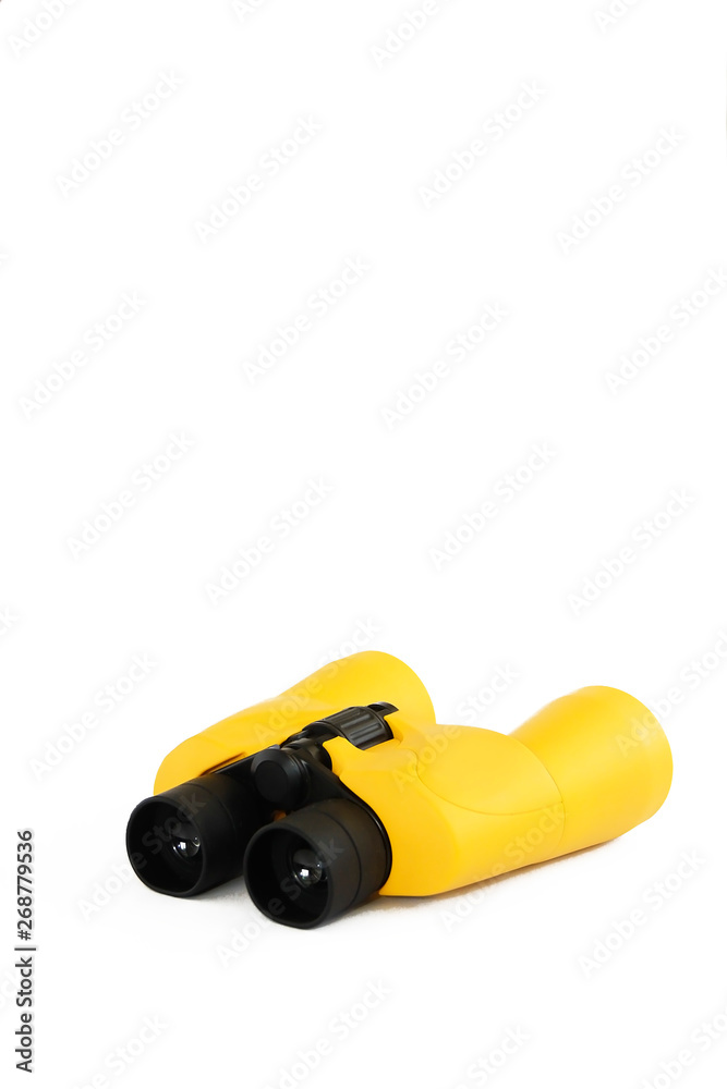 yellow marine optical plastic binoculars on a white background