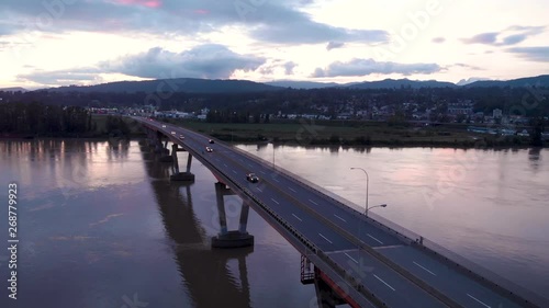Wallpaper Mural Aerial view of the Mission River bridge at dusk with cars commuting across it. Torontodigital.ca