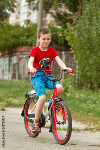 Happy boy ride the bicycle