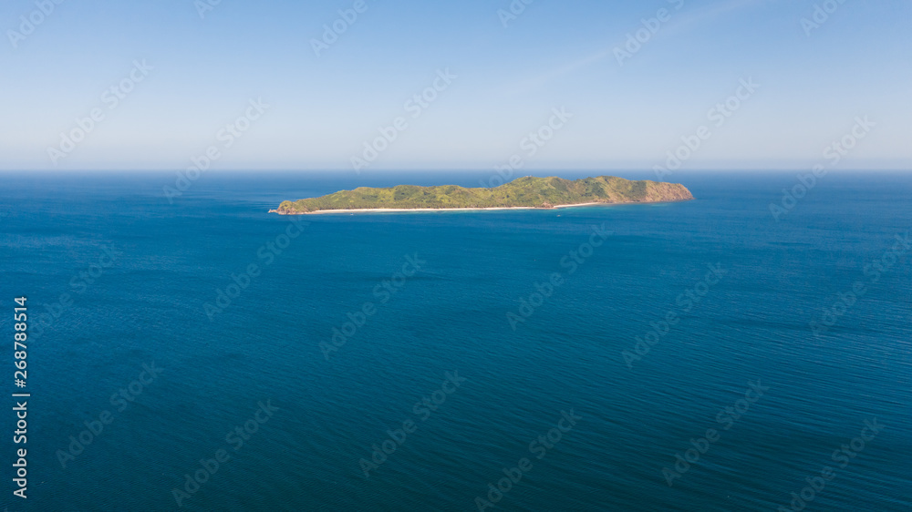 Blue sea and an island with a white beach in the distance. Seascape, Philippine Islands, view from above. Blue sea and an island with a white beach in the distance. Seascape, Philippine Islands, view from above.