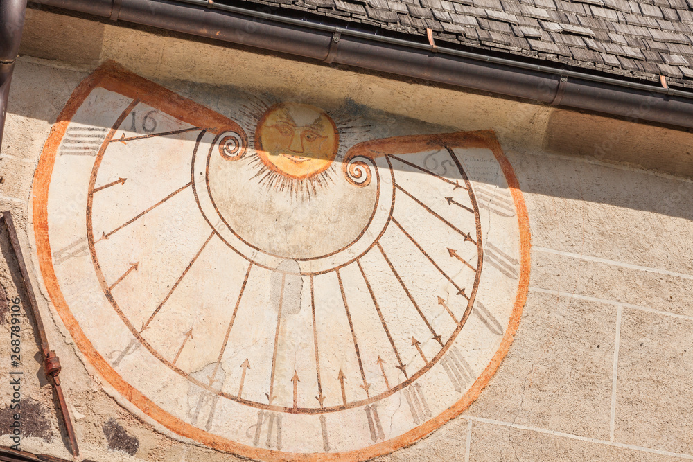 A detail of the old sundial painted on 1465 over the external wall of the little chapel of St. Magdalena in Val di Funes