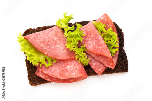 Sandwich with salami sausage on white background.