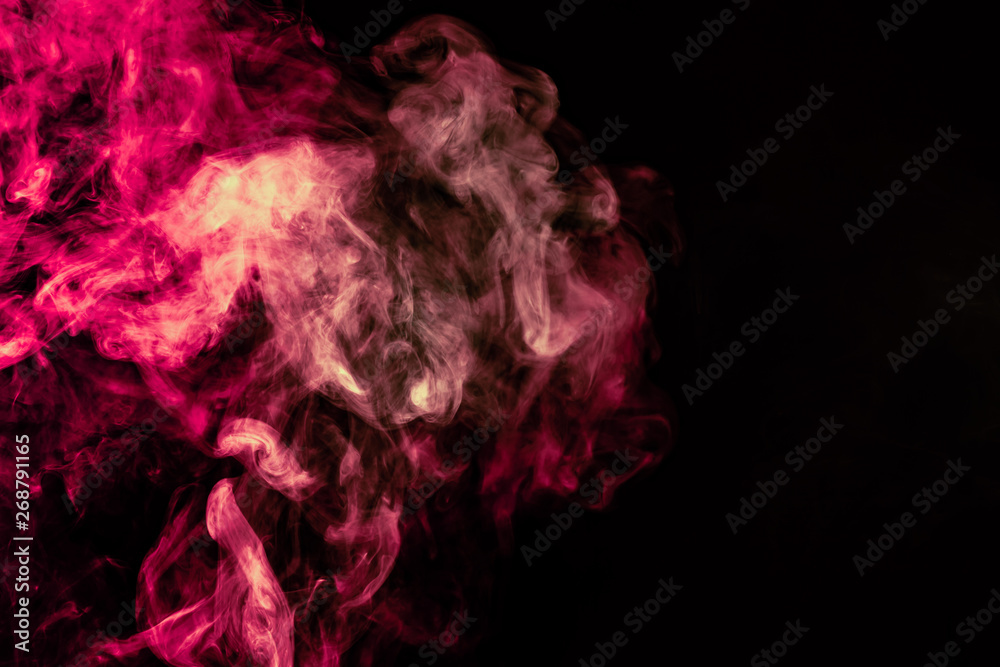 Beautiful column of smoke in the neon bright light of red, green, pink and turquoise on a black background exhaled out of the vape. Nice pattern for printing and backdrop of colored waves. Beautiful column of smoke in the neon bright light of red, green, pink and turquoise on a black background exhaled out of the vape. Nice pattern for printing and backdrop of colored waves.