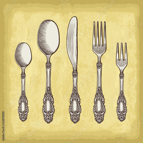 Hand drawn spoon, fork and knife. Old paper texture background. Engraved style vector illustration. Elements for your design works.