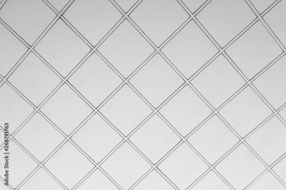 Fototapeta premium White ceiling with neon light bulbs in uprisen view.as background interior decoration concept with copy space for your text or design.