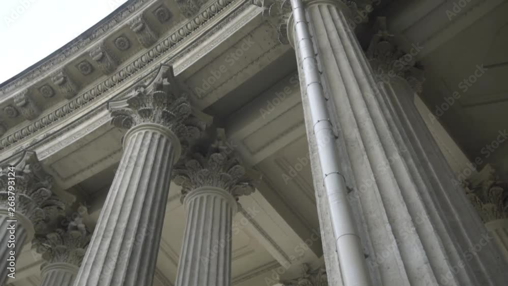 ancient cathedral with large columns and statues ancient cathedral with large columns and statues