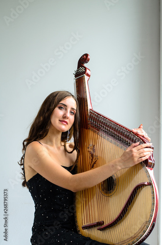 girl woman bandura musical instrument