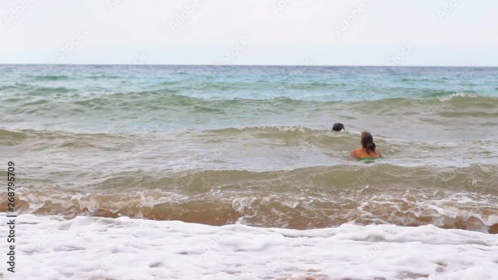 girl swimming in the sea