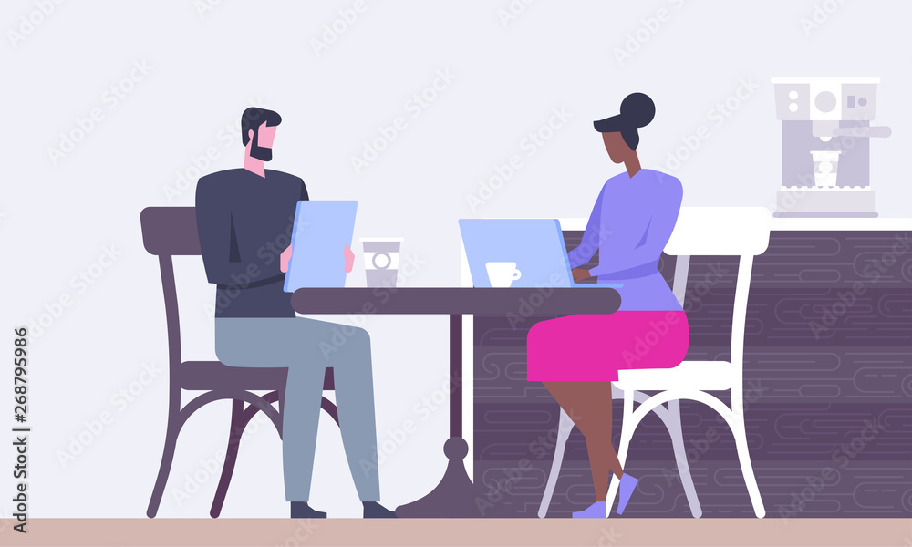 Modern workplace interior. Cafe in loft style. People in creative office co-working center Modern workplace interior. Cafe in loft style. People in creative office co-working center