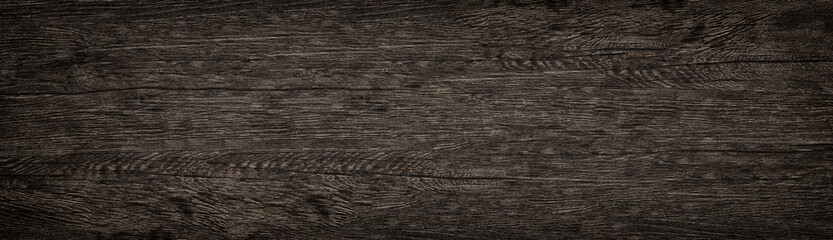Wooden solid surface wide texture. Dark brown wood panoramic background