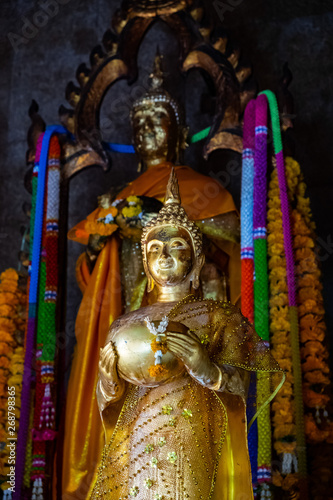 Buddha statues at Kampang Temple, Bnagkok, Thailand © Tossatis