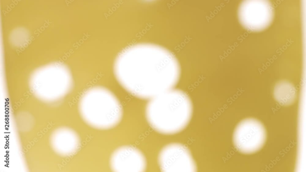 Slice of cheese with big holes falling from the camera to the white table from blur zone to focus. Slowmotionf from 60 fps Slice of cheese with big holes falling from the camera to the white table from blur zone to focus. Slowmotionf from 60 fps
