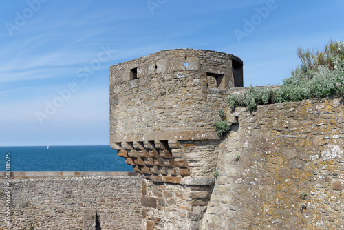 Beach and  ramparts of Saint Malo city in Brittany coast photo