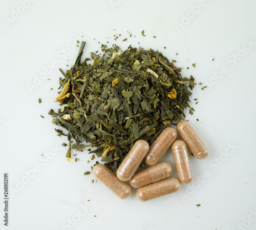 Green tea dried herbs and extract capsules