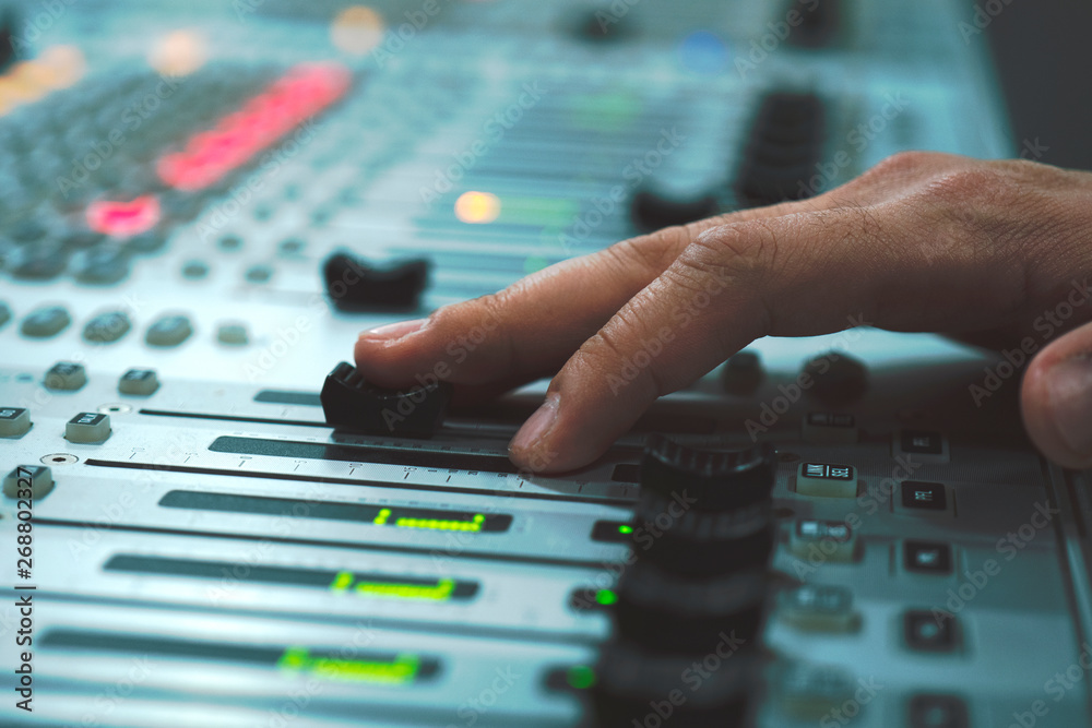 Professional audio mixing console with faders and adjusting knobs - radio / TV broadcasting Professional audio mixing console with faders and adjusting knobs - radio / TV broadcasting