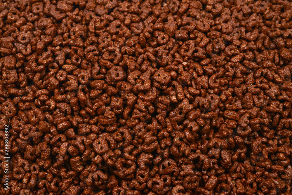 Corn-flakes background and texture. Top view. cornflake cereal box for morning breakfast. Corn-flakes background and texture. Top view. cornflake cereal box for morning breakfast.