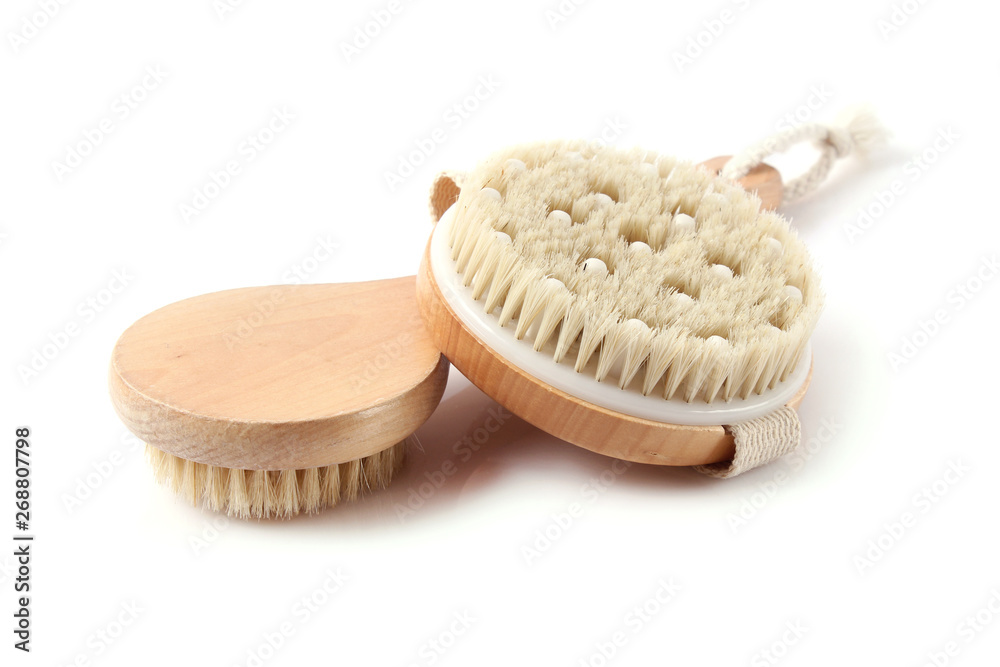 brush for dry massage on a white background isolated. brush for dry massage on a white background isolated.