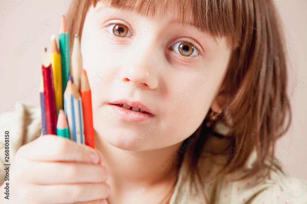 Art, creativity and education concept. Child girl with colorful pens. Art, creativity and education concept. Child girl with colorful pens.