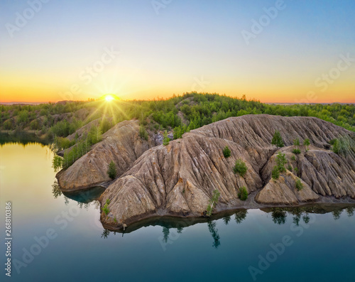 Konduki, Tula region, Russia. Aerial view of abandoned quarry turned into picturesque hills and blue lakes called Ushakovskiye Karyery photo