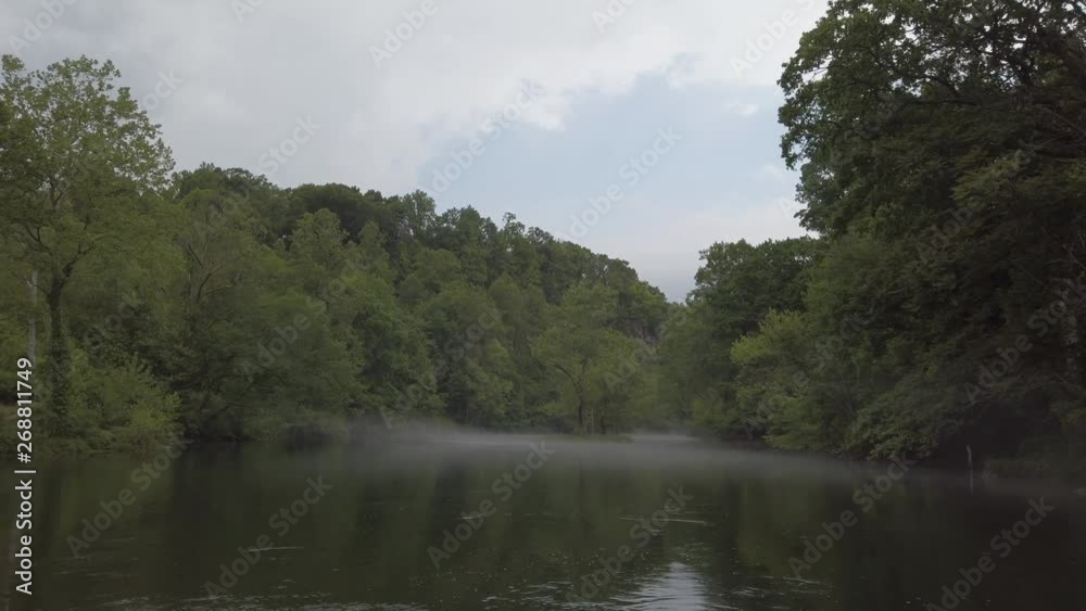 Floating down a river with small rapids in the mountains. Floating down a river with small rapids in the mountains.