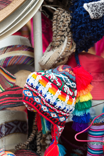 Multiple styles of peruvian hats at a local market in Cusco, Peru.  