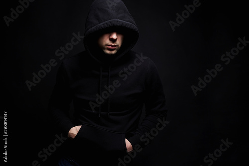 Man in Hood. Boy in a hooded sweatshirt