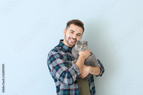 Young man with cute funny c...