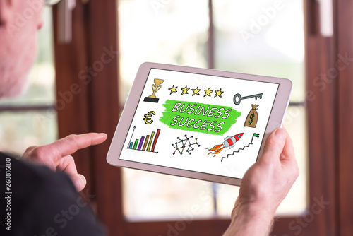 Business success concept on a tablet