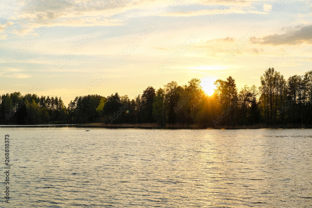 landscape with the image of the sunset over the lake Valdai