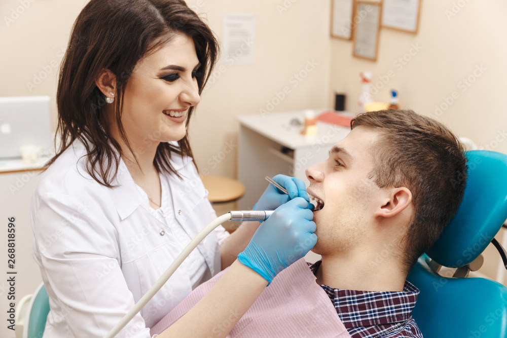 Fototapeta premium Doctor and patient doing some procedure in the cabinet