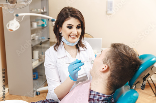 Doctor with patient in the dentist cabinet