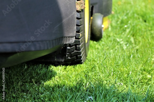 lawn mower on green grass
