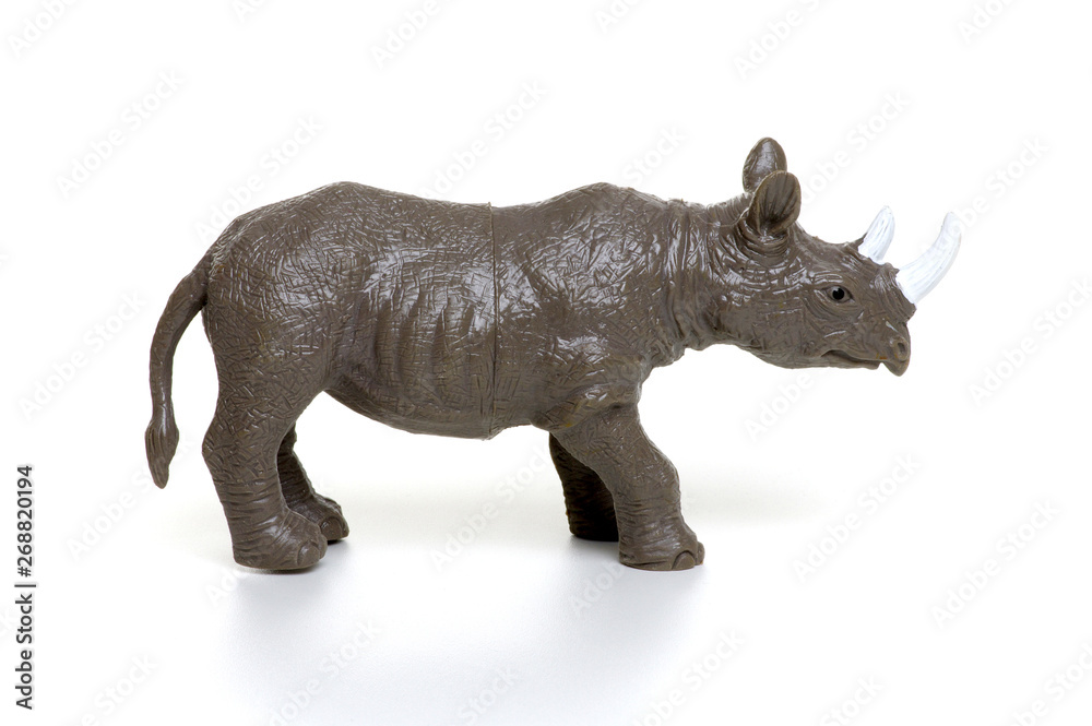 Fototapeta premium Rhinoceros toy isolated on white