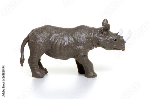 Rhinoceros toy isolated on white © Alekss