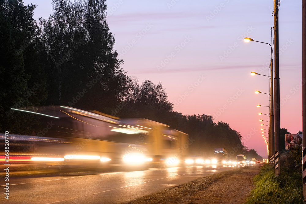 Moscow region, Russia - May, 18, 2019: night traffic on a highway in Moscow region, Russia