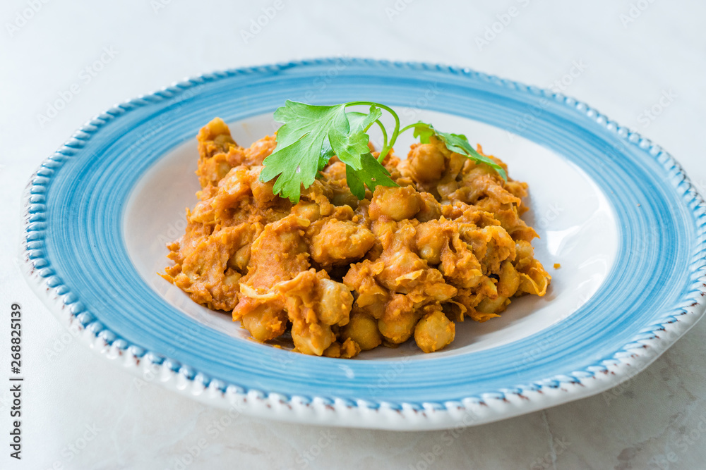 Chole or Chana Masala or Spicy Chickpeas is traditional North Indian main course recipe and usually served with Bhature or Roti/ Naan. Chole or Chana Masala or Spicy Chickpeas is traditional North Indian main course recipe and usually served with Bhature or Roti/ Naan.