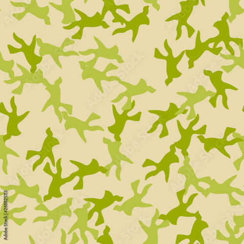 Field camouflage of various shades of green and beige colors