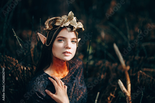 Dekoracja na wymiar  beautiful-elf-woman-fabulous-fairy-forest-famtasy-young-woman-with-long-ears-long-dark-hair-golden-wreath-crown-on-head