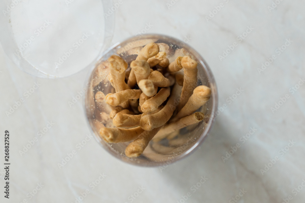 Salty Sticks in Round Plastic Package Ready to Eat. Salty Sticks in Round Plastic Package Ready to Eat.
