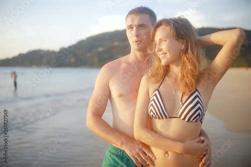 loving couple on the beach / summer vacation, sea coast, love, romantic vacation at sea