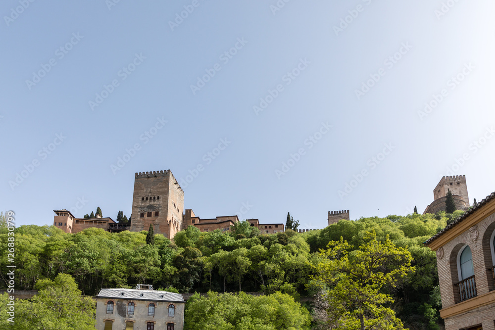 Views of the Alhambra from the other side of the valley, in the Albaicín neighborhood in Granada, Spain