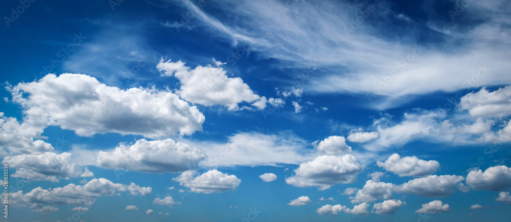 Obraz premium Blue sky background with clouds.