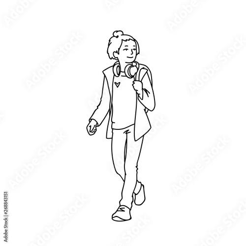 Cute teen girl with headphones and backpack taking a walk. Monochrome vector illustration of teenage girl in jacket, jeans and sneakers walking. Black lines isolated on white background.