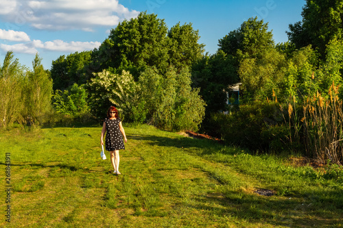 woman walking in a field