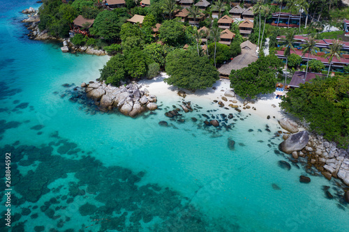 Aerial drone view of beautiful tropical Sunrise Beach during sunny summer day, Koh Lipe, Thailand