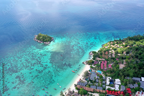 Aerial drone view of beautiful tropical Koh Lipe island during sunny summer day, Thailand