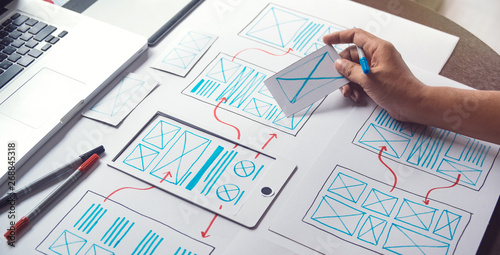 ux Graphic designer creative sketch planning application process development prototype wireframe for web mobile phone . User experience concept.