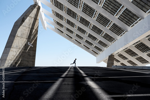 Man riding skate on contemporary urban place photo