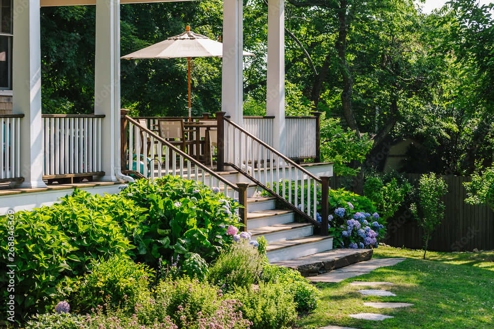 Back Porch of Residence in Summer with Beautiful Garden Back Porch of Residence in Summer with Beautiful Garden